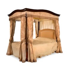 AN EDWARDIAN MAHOGANY FOUR