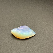 Australian Opalised Shell From Coober Pedy Blue Green Purple Flashes 5.1cts