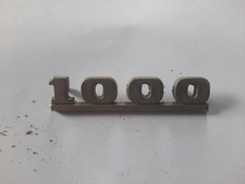 Morris Minor 1000 car emblem chrome 1970s