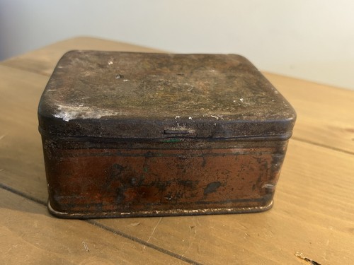 Antique rusted metal tin faded - rusted,