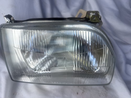 Ford escort mk4 headlight - ford,