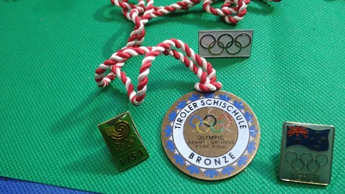 Four olympic themed pin badges - olympic,