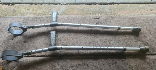 Pair cooper elbow crutch - of,