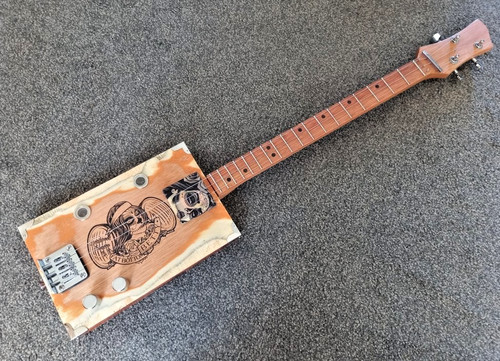 Cigar box guitar string - guitar,