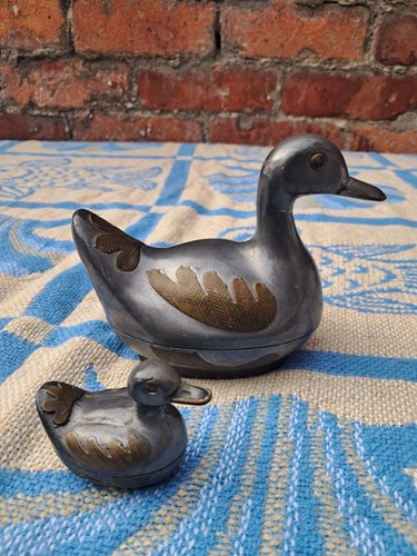 Two vintage pewter - , duck
