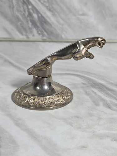 Metal chrome jaguar leaping - metal,