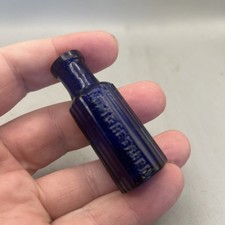 EXTREMELY SMALL BLUE GLASS