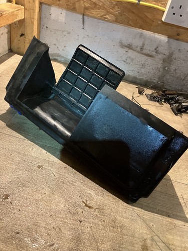 Rear mulching recycling shute - rear,