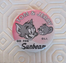 SUNBEAM LAPEL BADGE. TOM AND