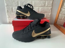Shox NZ deliver  black  gold in  size 6 UK / 40 EUR / 7 US