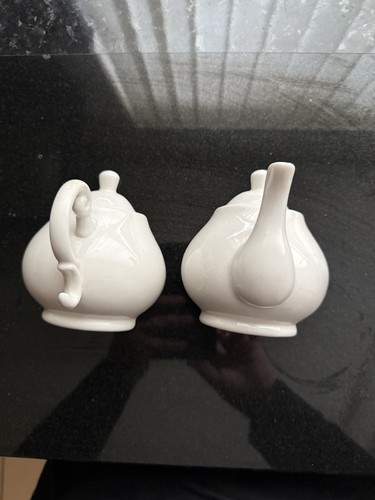 Wall mounted white teapots - mounted,