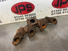 Exhaust manifold X Kubota V2403-M-T 4 cyl. turbo diesel engine / R324T £120+VAT