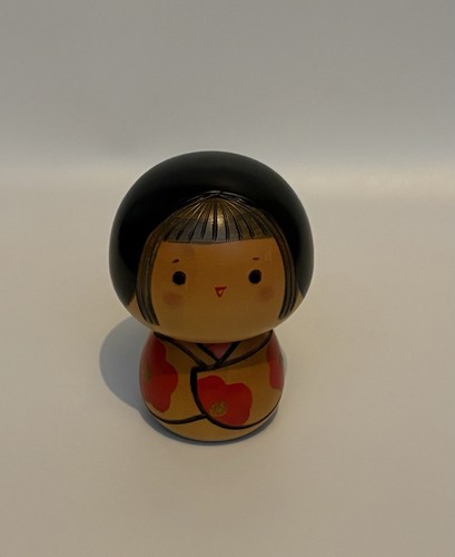 Kokeshi doll yuji smiling face - yuji,