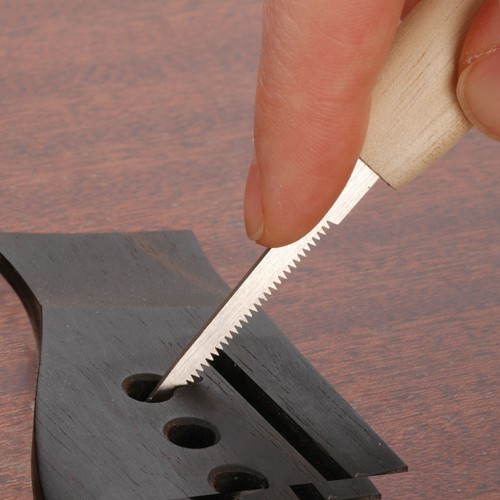Bridge pin hole slotting - bridge,