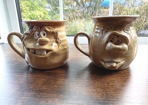 Two ugly mugs hand - two,