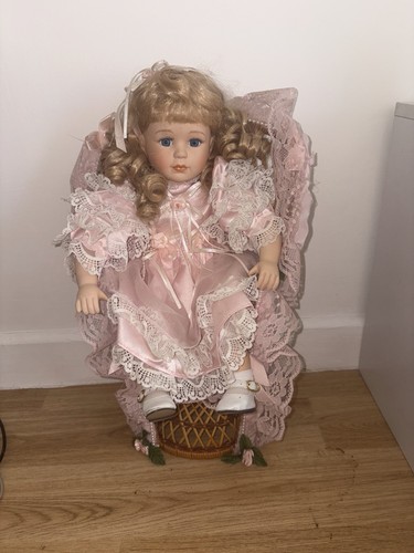 Sitting porcelain doll - sitting,