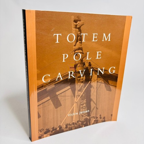 Totem pole carving bringing - carving, a
