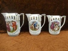 BEAUTIFUL SET OF THREE ANTIQUE EDWARDIAN PORCELAIN JUGS . M329