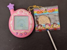 pink BANDAI Tamagotchi Ura - Japanese Language V4.5 with charm