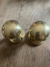 pair of old english victorian style brass door knobs