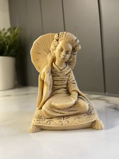 Resin Ivory Effect Sitting