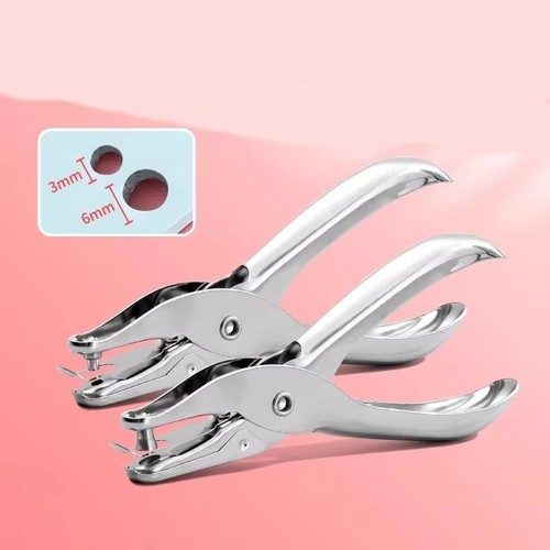 Single one hole punch paper - one,