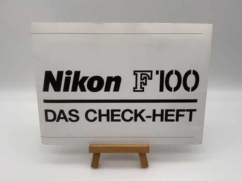 Nikon f100 the check booklet - the,