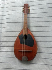 Flat back back mandolin in