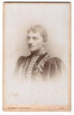 Photograph Schmidt & Wegener, Kiel, Danish Street 35, young woman in puff sleeve 