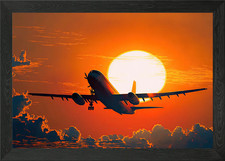 plane sunset Framed Wall Art