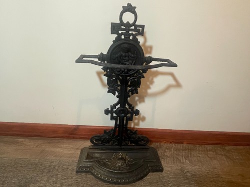 Antique umbrella stick stand - umbrella,