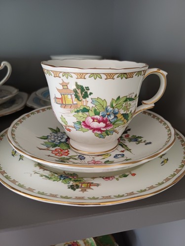 Teacup and saucer side - and,