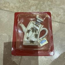 THE MINIATURE TEAPOT