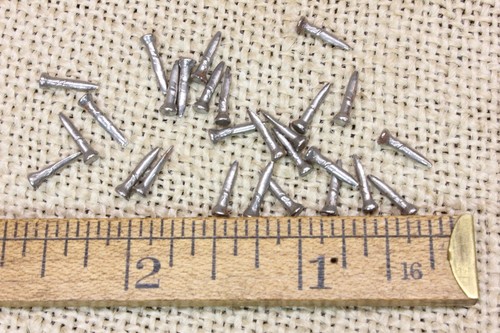 Old square iron - 3/8”, nails