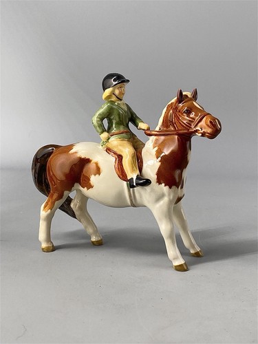 Beswick girl skewbald pony - girl, on