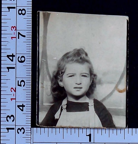 Squinting little girl photo - squinting,