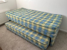 single bed with guest pull
