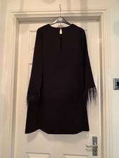dress size 14 with feather