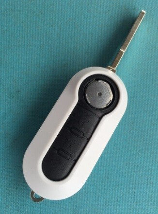 White button remote fob - remote,