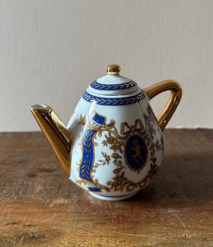 Porcelain art miniature teapot - art,