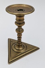 17TH / 18TH CENTURY CONTINENTAL TRIANGLE BASED BRASS SMALL CANDLESTICK