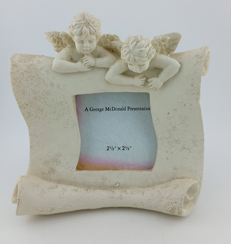 Cream off white cherub scroll - cream,