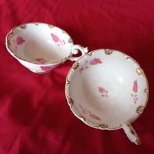 TWO ANTIQUE DAVENPORT PINK