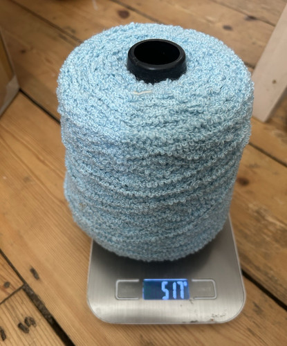 Light blue boucle - boucle,