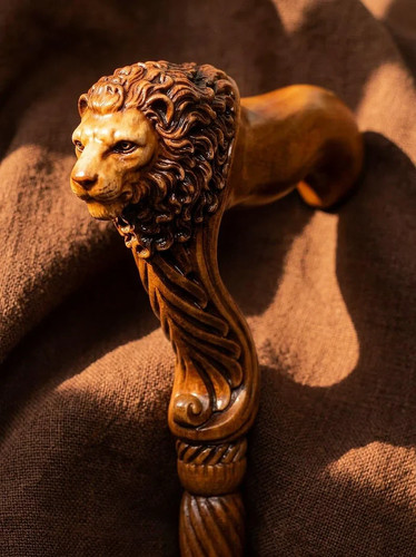 Hand carved lion head - hand,
