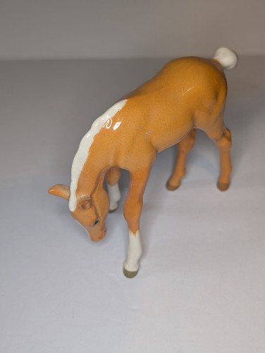 Beswick palomino grazing foal - beswick,