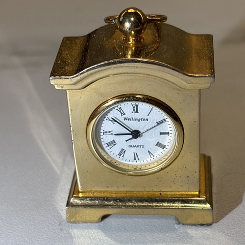 Miniature brass quartz - quartz, clock