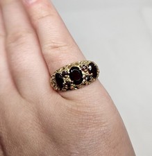 9ct Gold And Garnet 7 Stone
