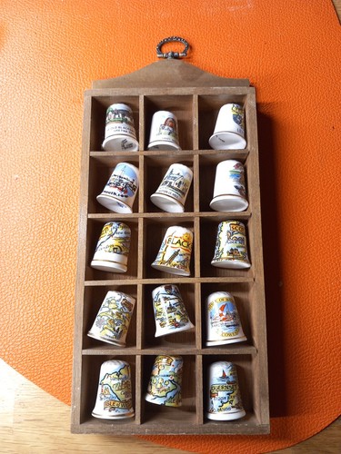 Wooden thimble display - thimble,