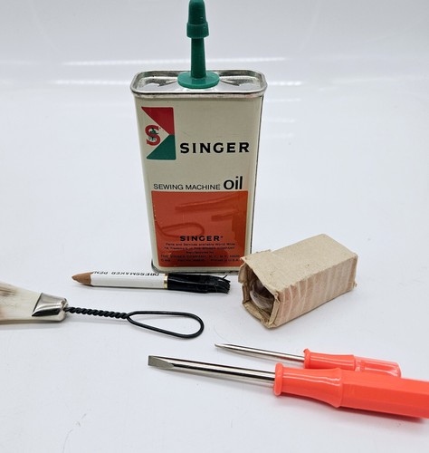 Singer sewing machine - machine, oil